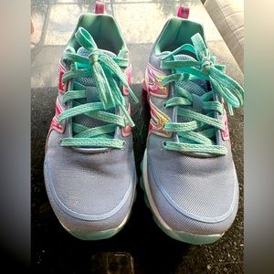 Little girl sketchers sneakers.